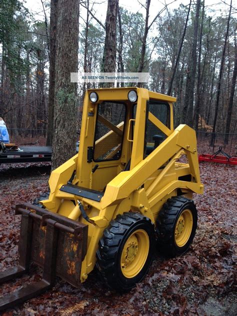 john deere 575 skid steer attachments|john deere construction 575 specs.